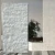 Kamień elewacyjny marmur Pure White Stackstone 10x36 cm - biały łupany kamień dekoracyjny